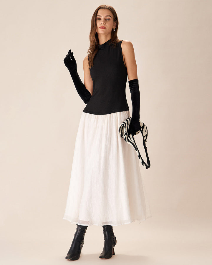 Schwarzes, geripptes Maxikleid mit kontrastierenden פרטים aus Strick