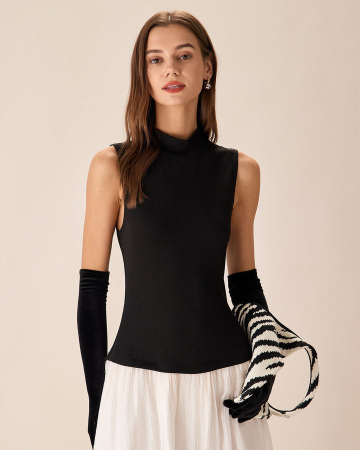 Schwarzes, geripptes Maxikleid mit kontrastierenden פרטים aus Strick