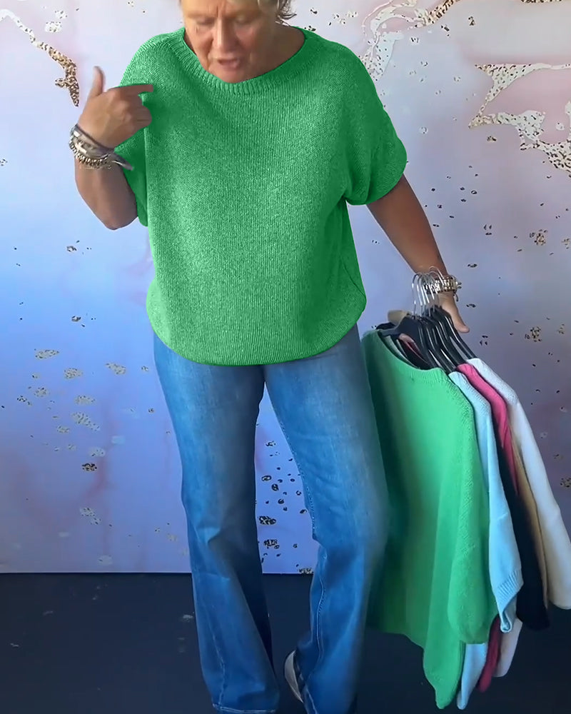 סוודר בצבע אחיד עם גזרה נינוחה וצווארון עגול