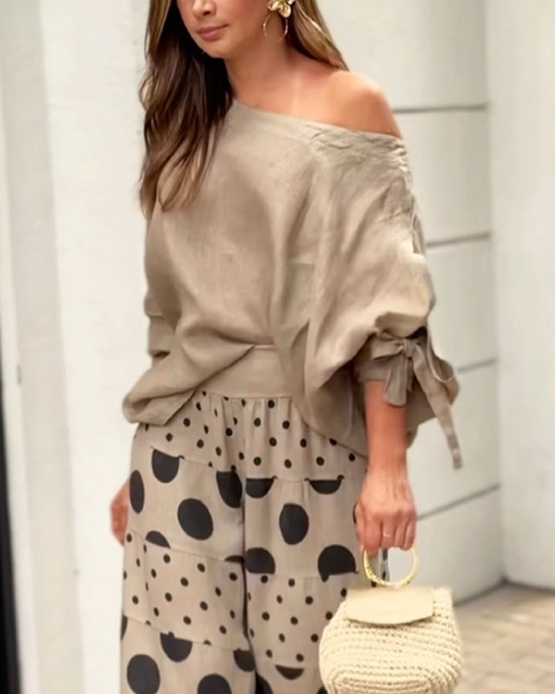 Relaxed Shoulder Top and Patterned Pants Two-Piece Outfit