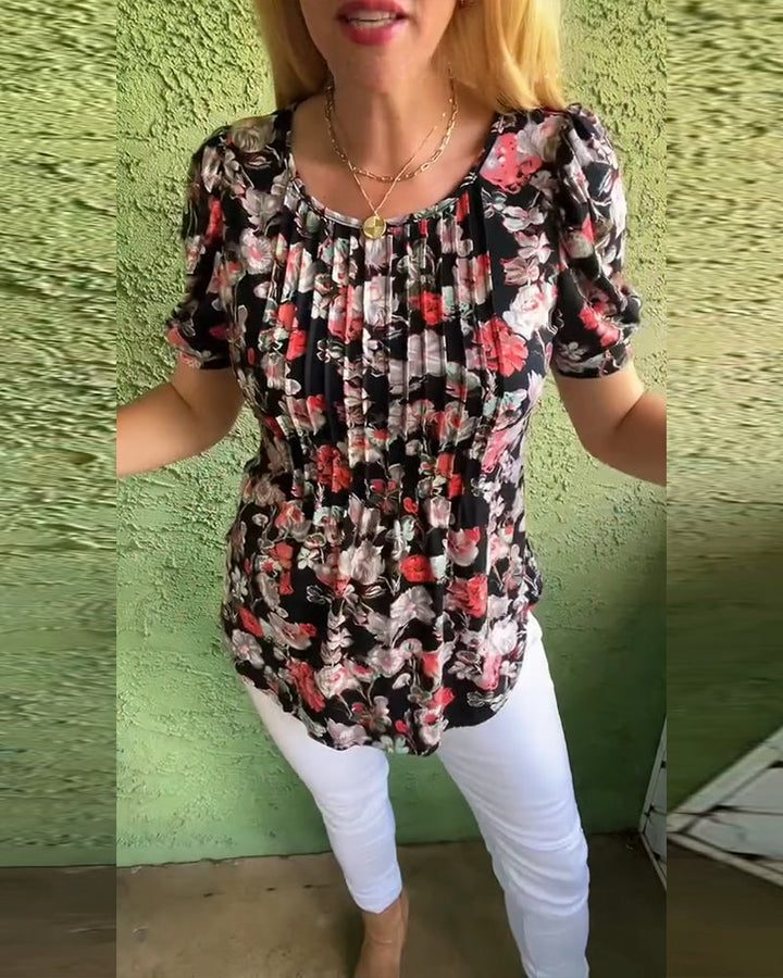 חולצה פרחונית עם קפלים, צווארון עגול ושרוולים נפוחים