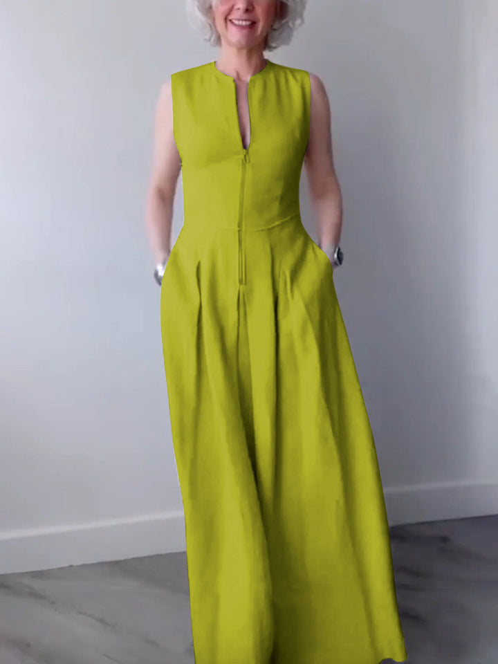 Maxi Dress with A-Line Loose Fit, Pleats, Pockets, Split Joint, and Zipper - Round Neck Design