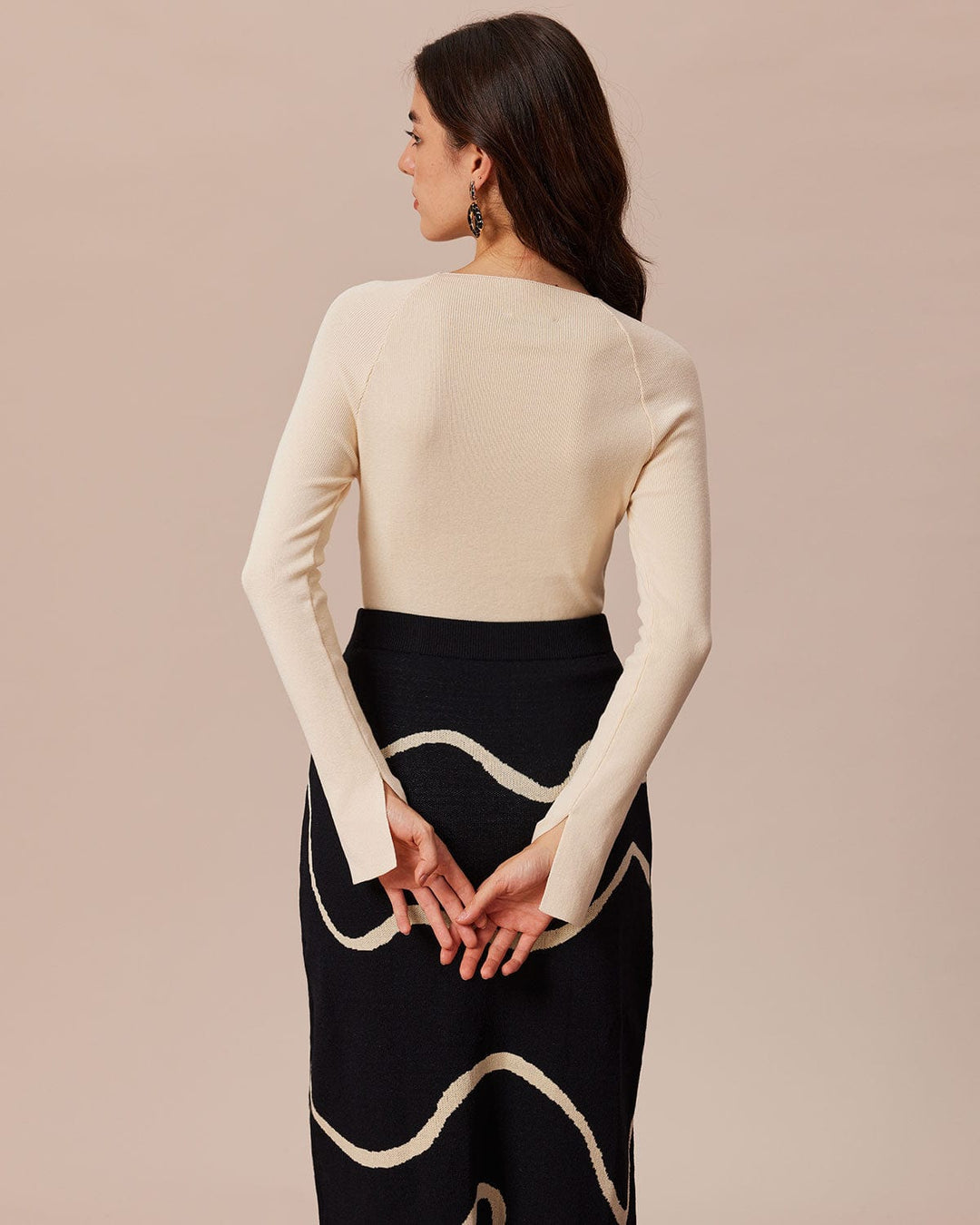 Beiges geripptes Strickoberteil mit Cut-Outs und Schleifen-Detail