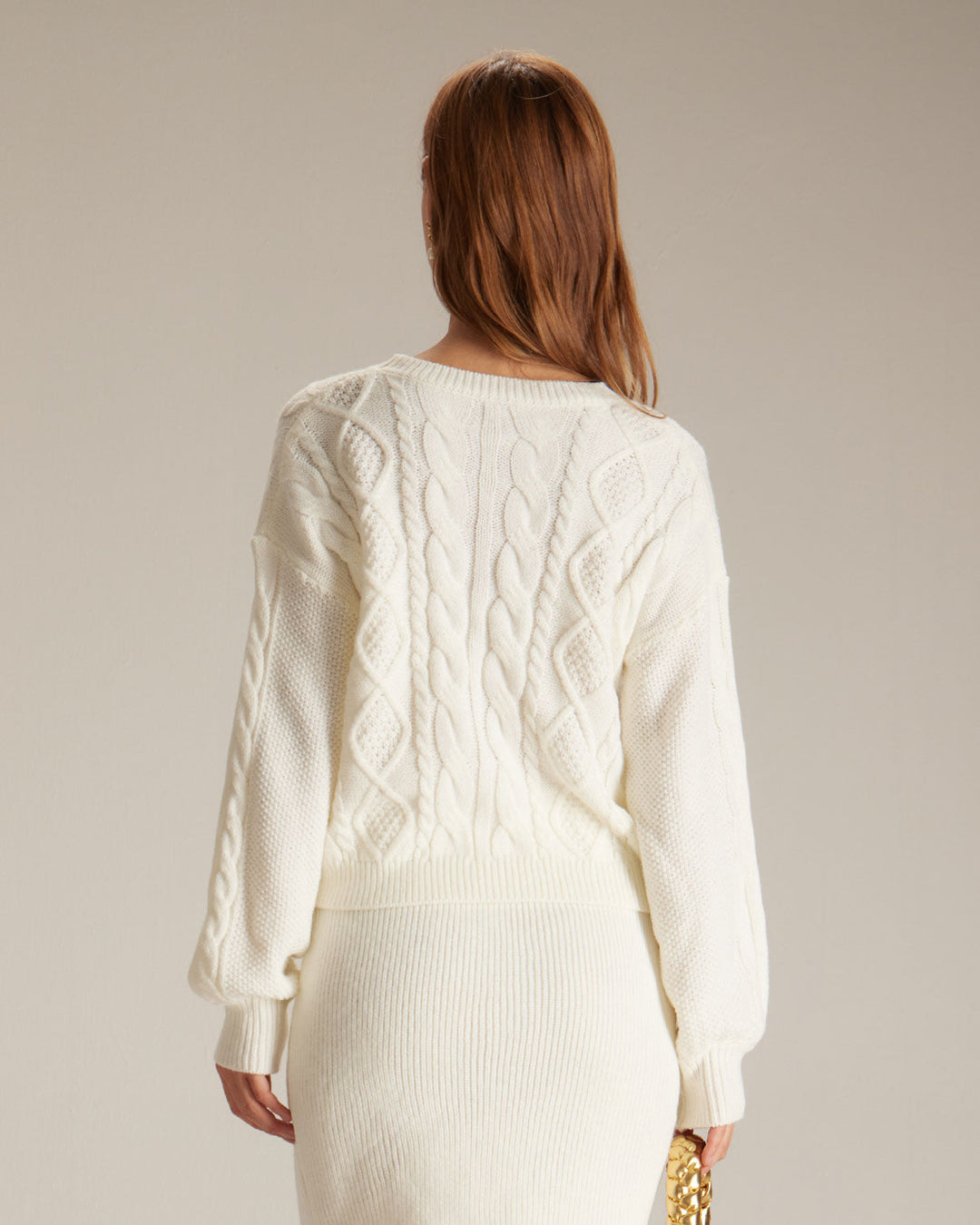 Beiger Rundhals-Pullover mit geripptem Zopfmuster