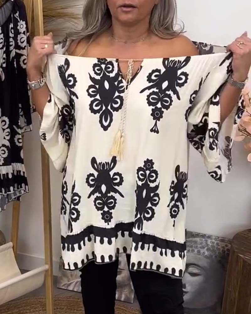 חולצה עם גזרה רחבה וגזרה פתוחה
