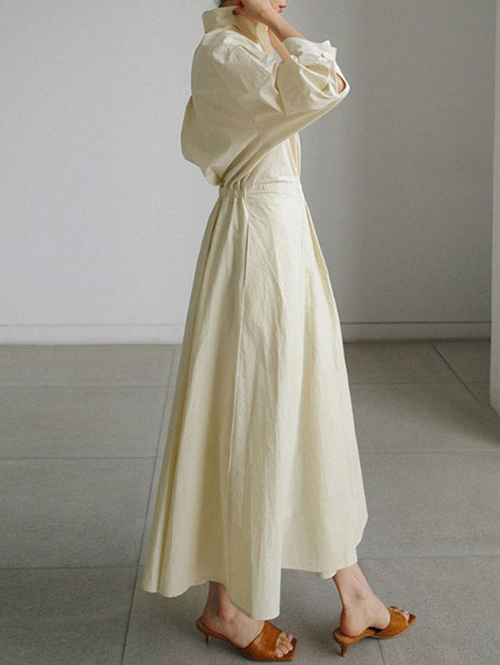 Chic Midi Dress with Pocket, Button Detail, and Lapel Collar