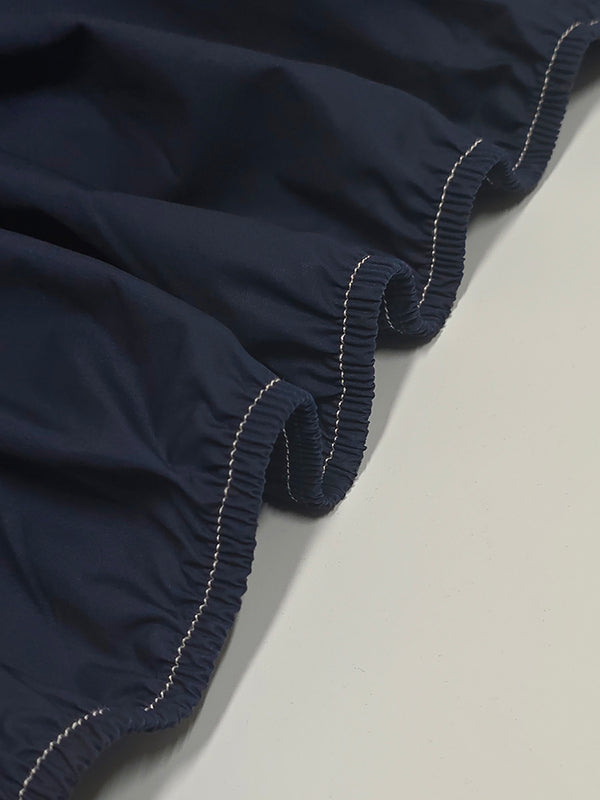 Solid Color Midi Dress with Long Sleeves, Loose Fit, Buttoned Pockets, and Lapel Collar