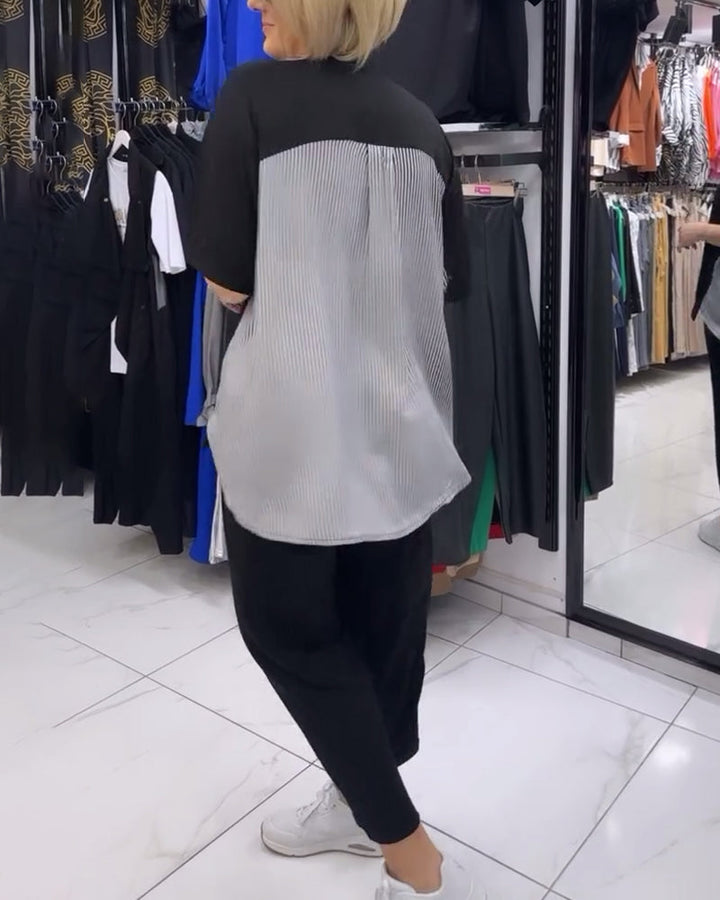 חולצה עם פסים דקים בגזרה נינוחה וטלאים